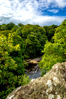 a view looking down from O'Cahan's Rock down to Sir Thomas Philips Weir in the "Roe Valley Country Park" in Limavady famous known as the Dog leap