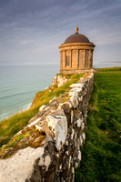 The Mussenden temple at the Downhill during sunset captured in portrait orientation