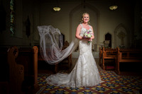portrait of a bride with her veil falling at St. Mary's Chapel in Limavady